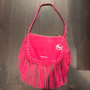 Michael Kors suede fucsia and gold handbag